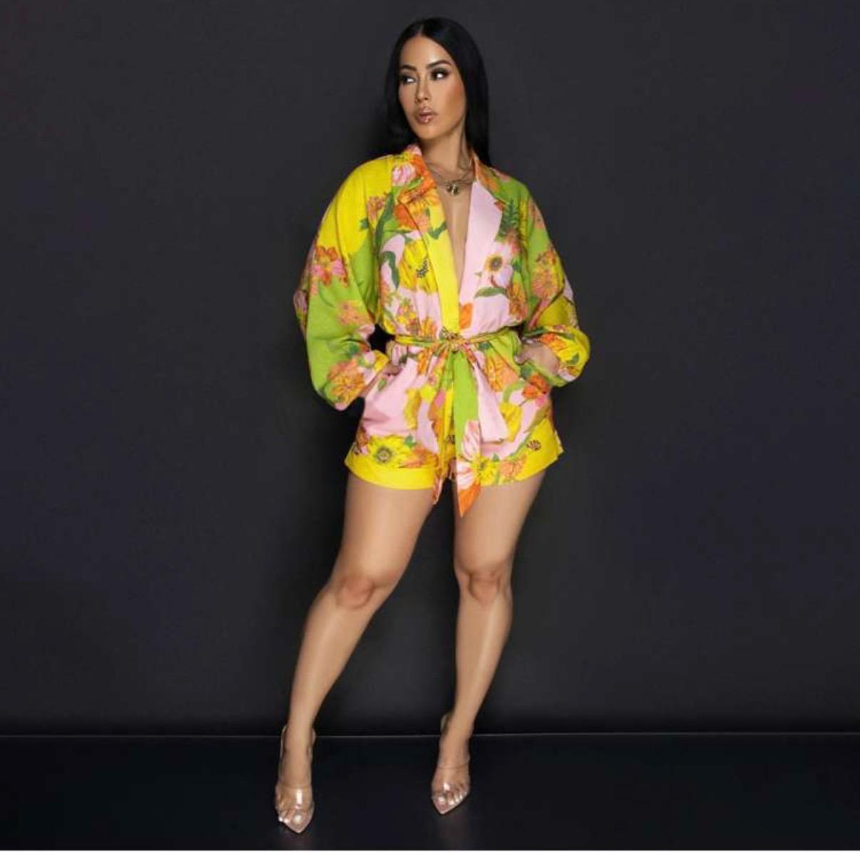 Thia Turn heads with the Linen Floral Printed Shawl Collar Bandage Rompers