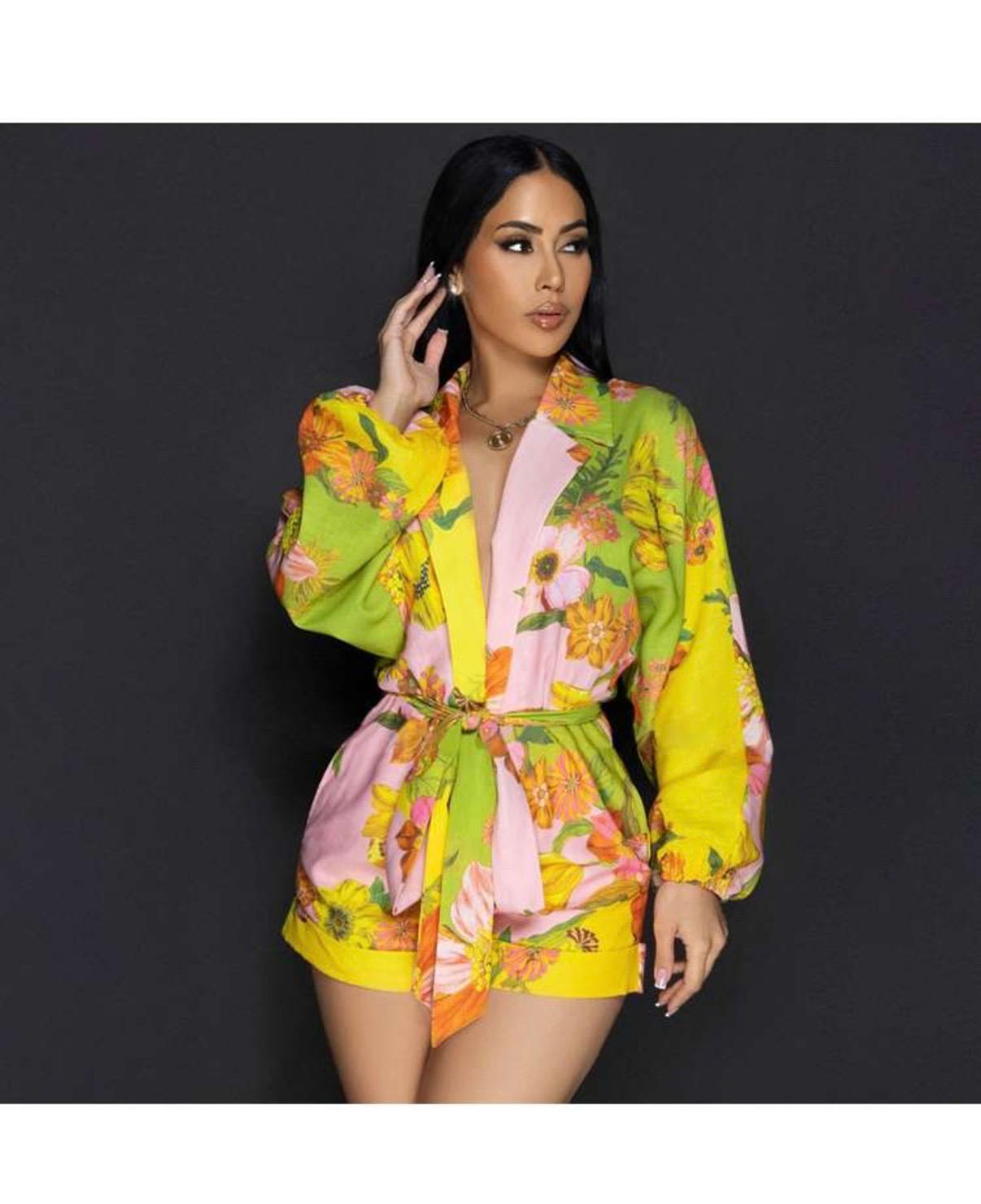 Thia Turn heads with the Linen Floral Printed Shawl Collar Bandage Rompers